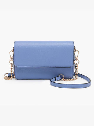 Light blue leather crossbody handbag with gold chain strap and structured flap design.
