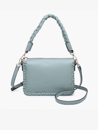 Light blue leather handbag with braided top handle and adjustable crossbody strap.
