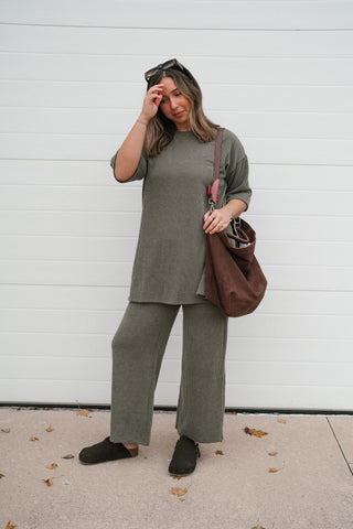 Full-length view of the olive ribbed matching lounge set with relaxed tee and wide leg pants