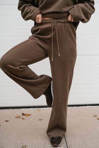 Model wearing the All Day Comfort mocha ribbed wide leg lounge pants with the matching crewneck top
