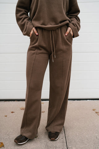Front view of the mocha matching lounge set pants with side pockets and drawstring waist
