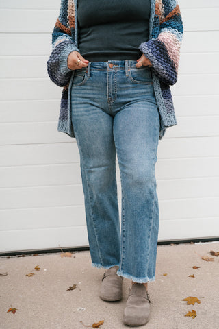 Front view of the Risen Avery ankle straight jeans showing the high rise and raw frayed hem