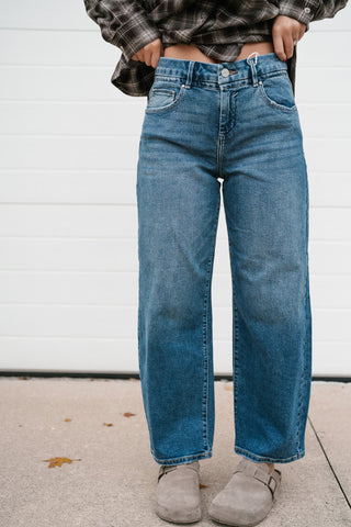 Close-up front view of the Risen Peyton slouchy barrel jeans in medium wash