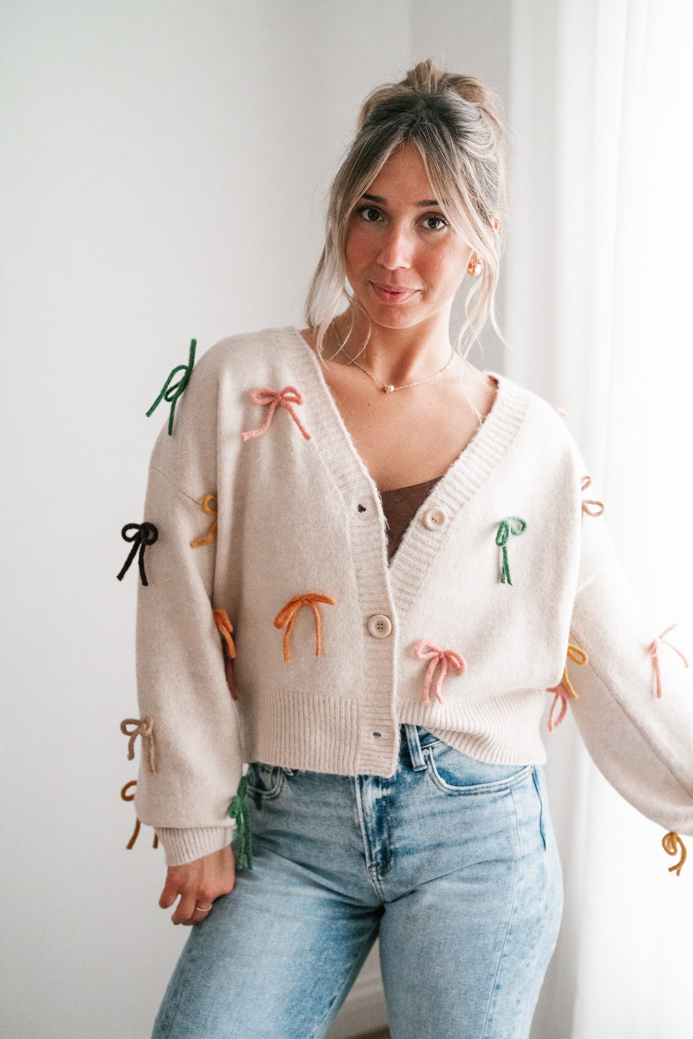 About The Bows Button Up Sweater