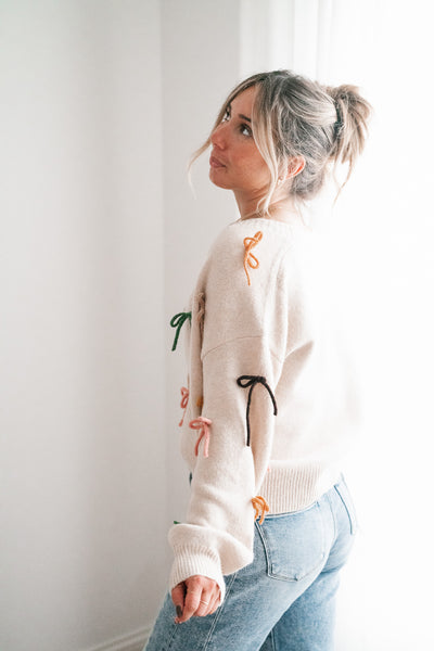 About The Bows Button Up Sweater