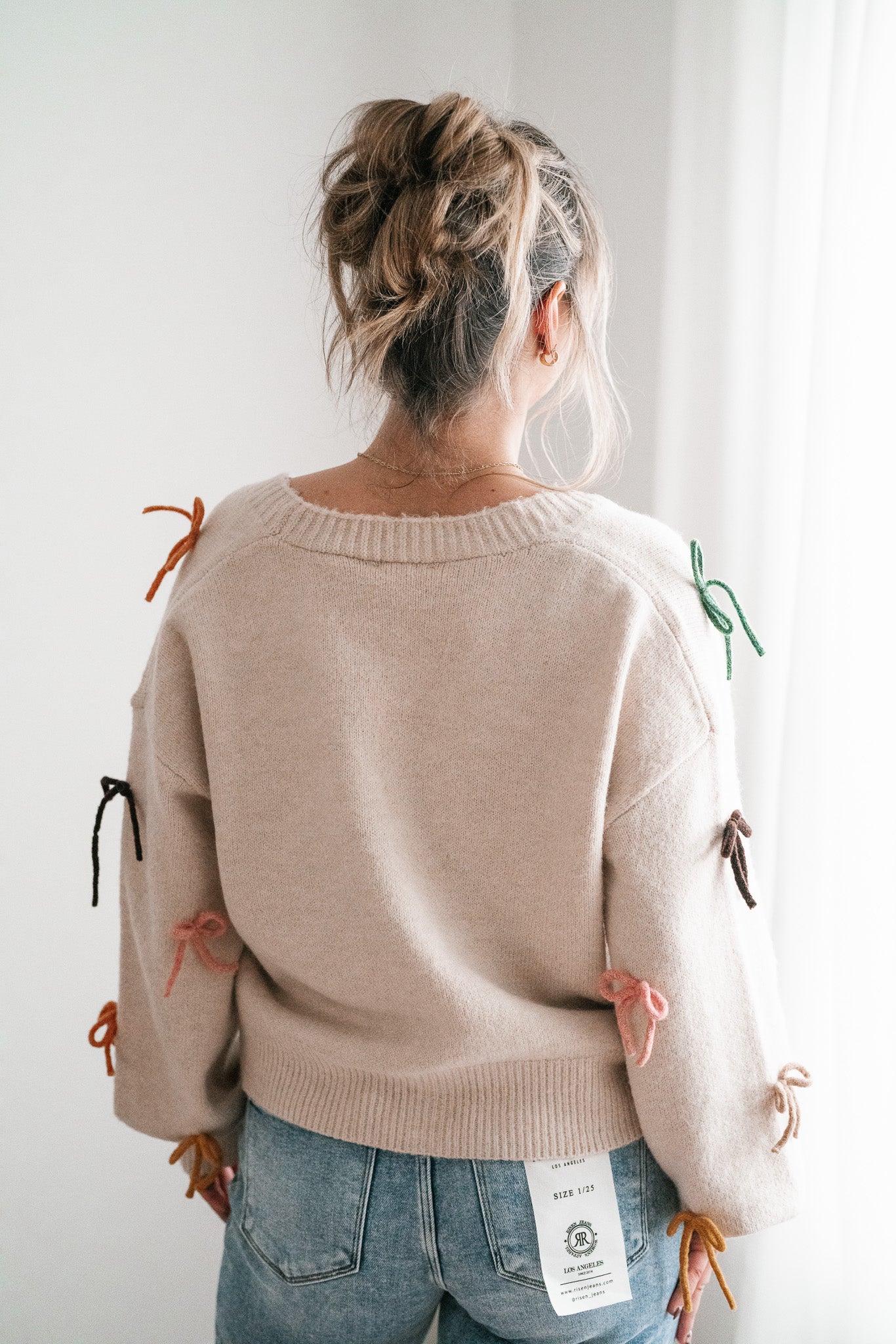 About The Bows Button Up Sweater