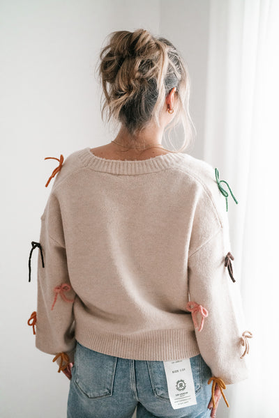 About The Bows Button Up Sweater