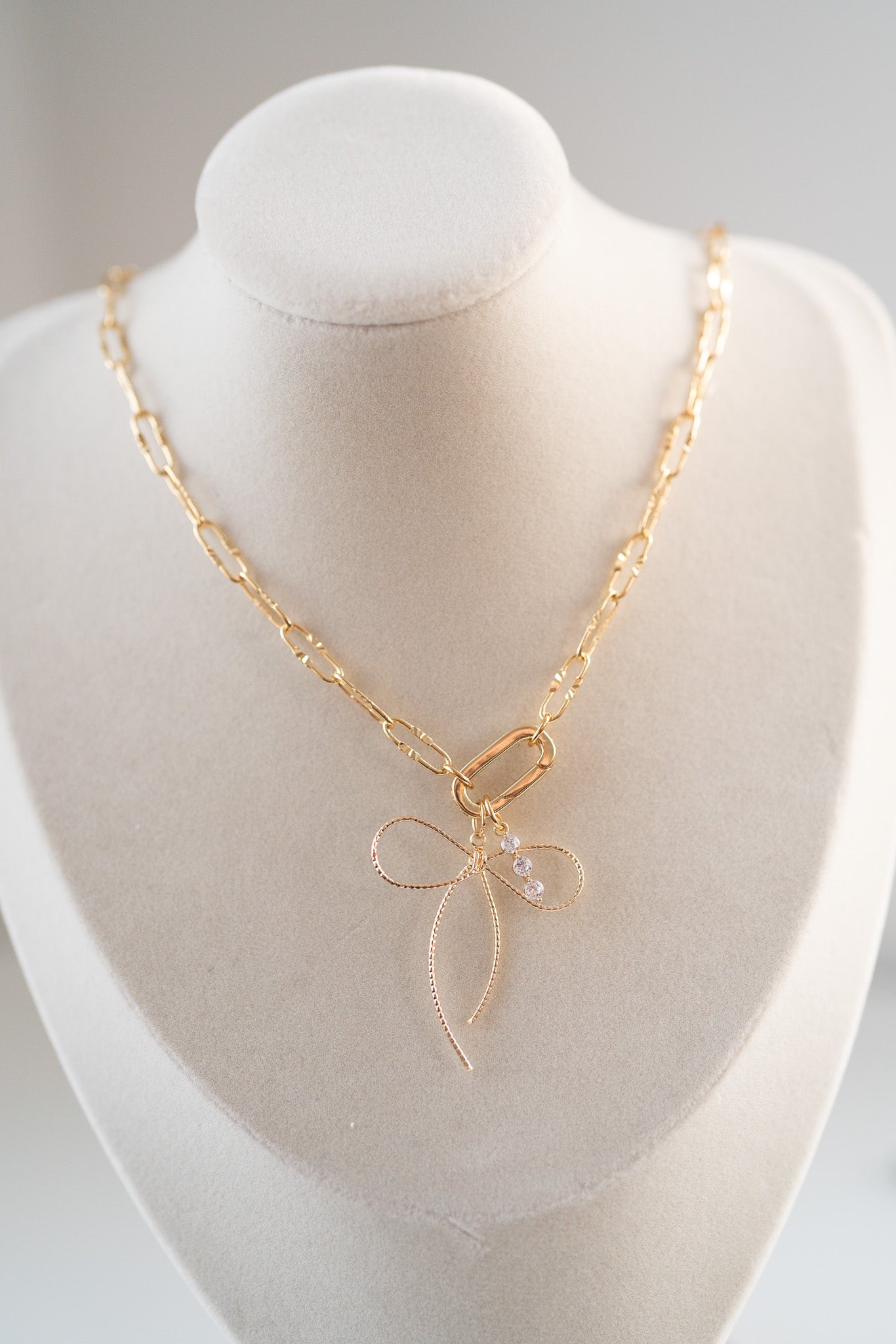 Golden Bow Luxe Charm Necklace