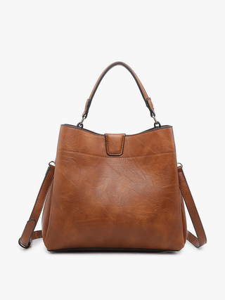 Cognac brown leather handbag with top handle and adjustable crossbody strap featuring a structured everyday silhouette.