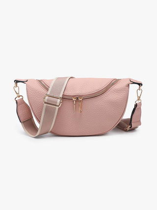 Blush pink leather half-moon crossbody sling bag with adjustable striped strap and gold zipper.